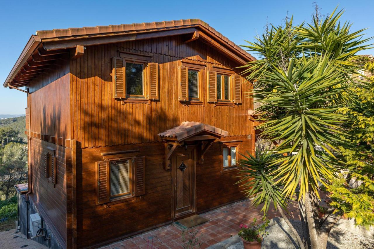 Casa De Madera En Calafell Exterior foto